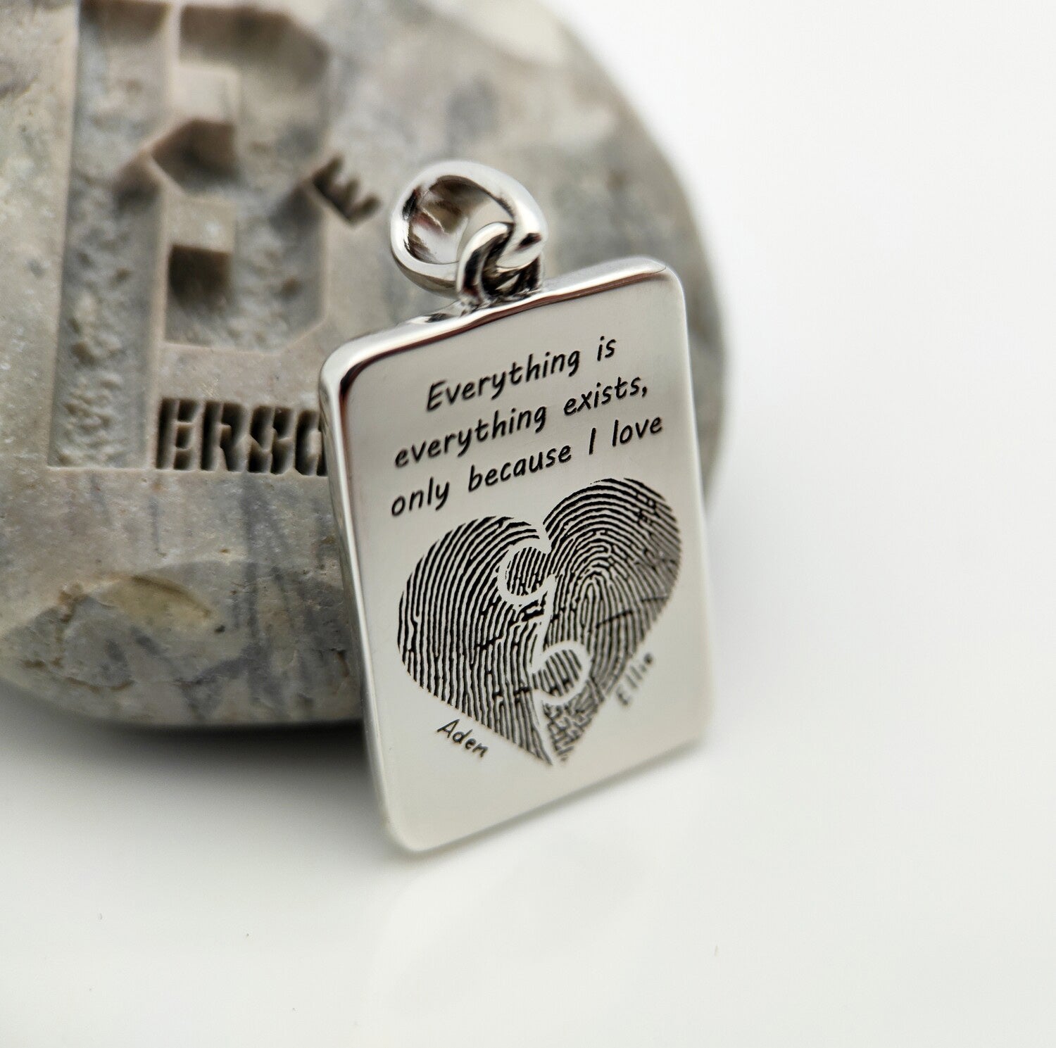 Silver rectangular pendant with engraved fingerprint heart and message