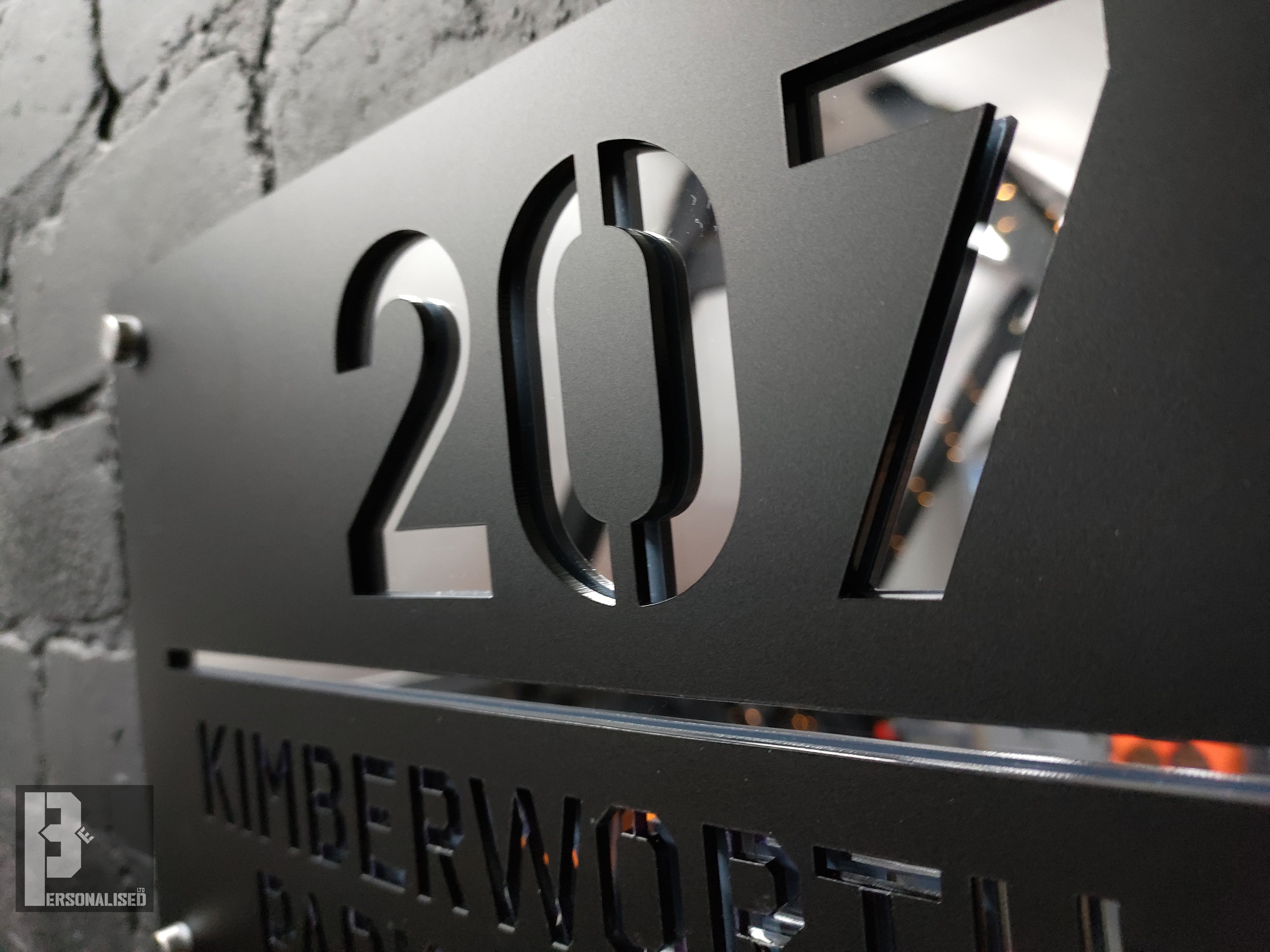 Black metal house number plaque 207 Kimberworth