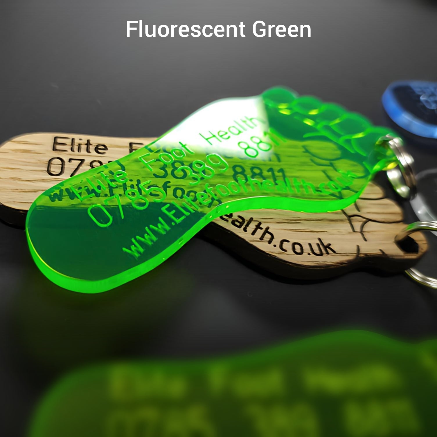 Fluorescent green translucent acrylic foot keychain engraved for podiatrists