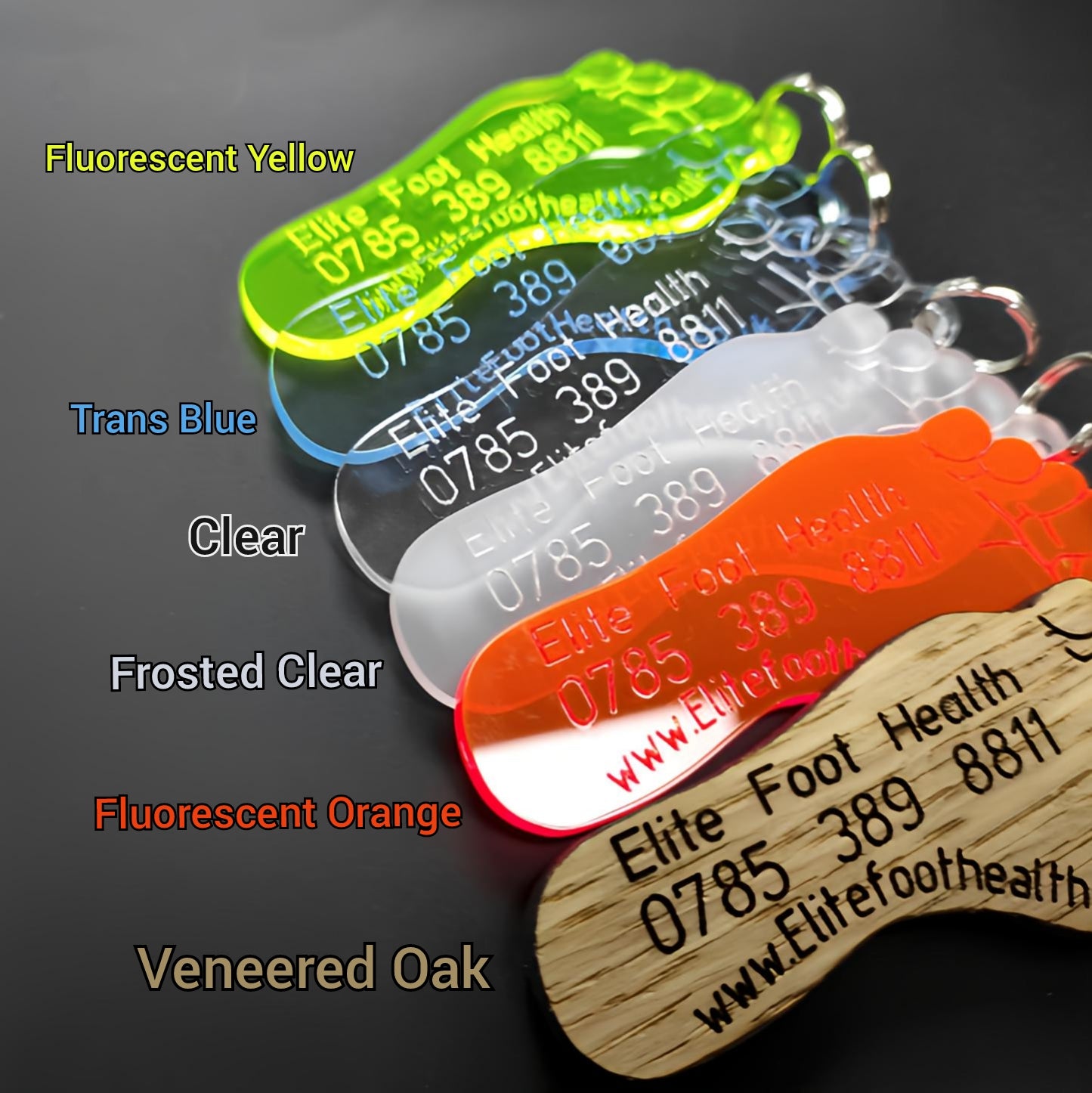 Acrylic feet keyrings in various colors for podiatrists and chiropodists
