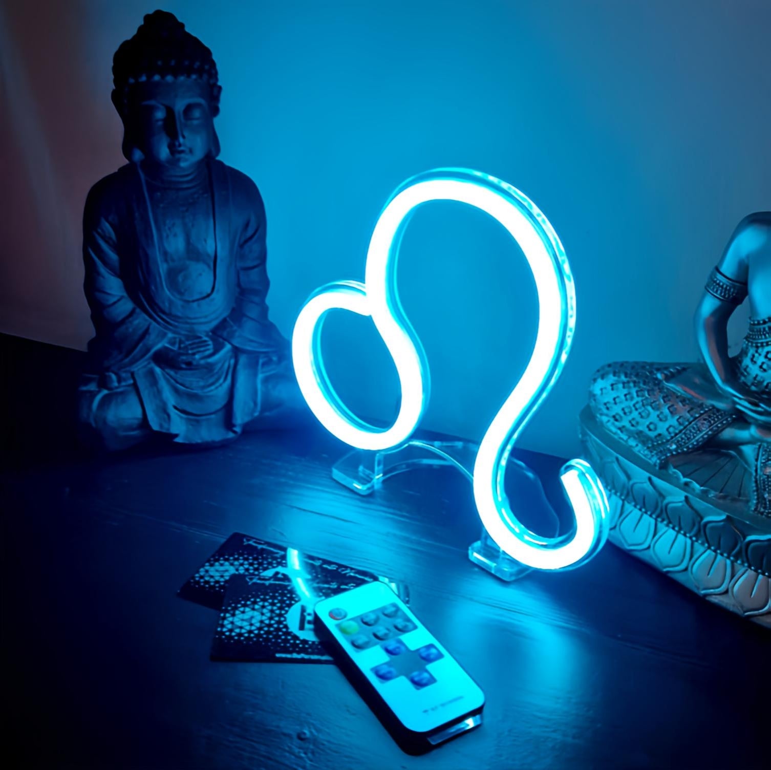 Leo zodiac neon sign glowing blue on acrylic stand ♌ July 23 - August 22