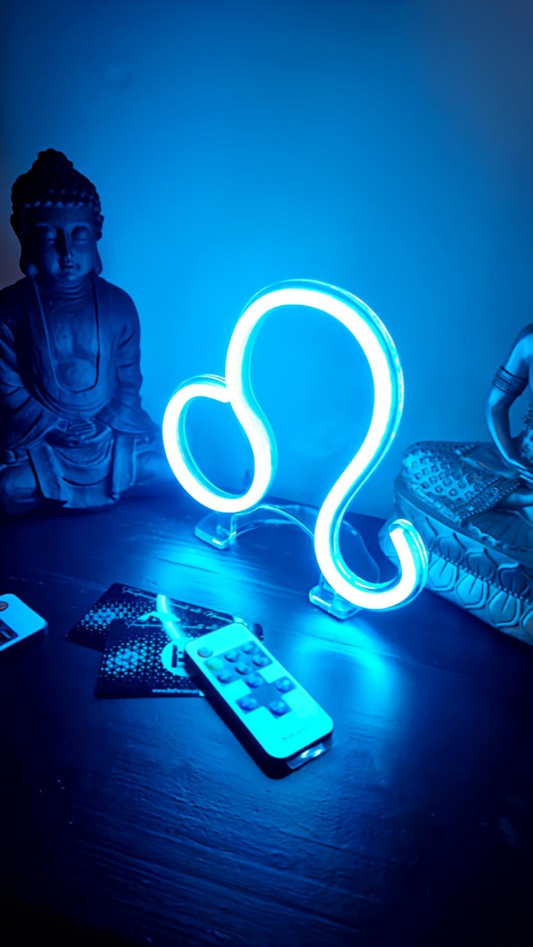 Glowing blue neon Leo zodiac sign โ July 23 - August 22