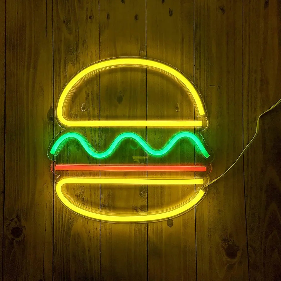 Glowing burger LED neon sign for fast food restaurant with yellow buns green lettuce red patty