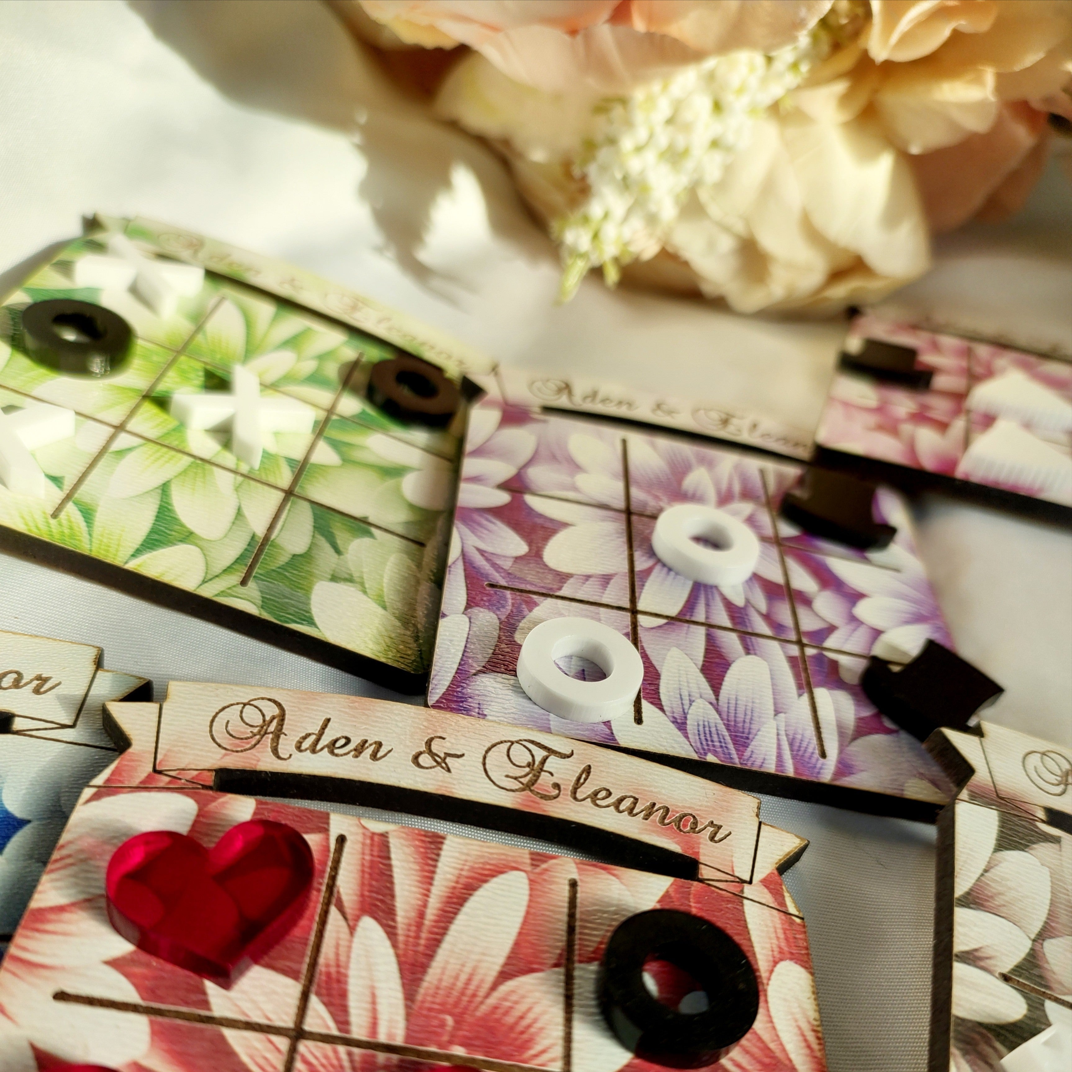 Floral wooden tic-tac-toe boards with button pieces for Game On! wedding favours